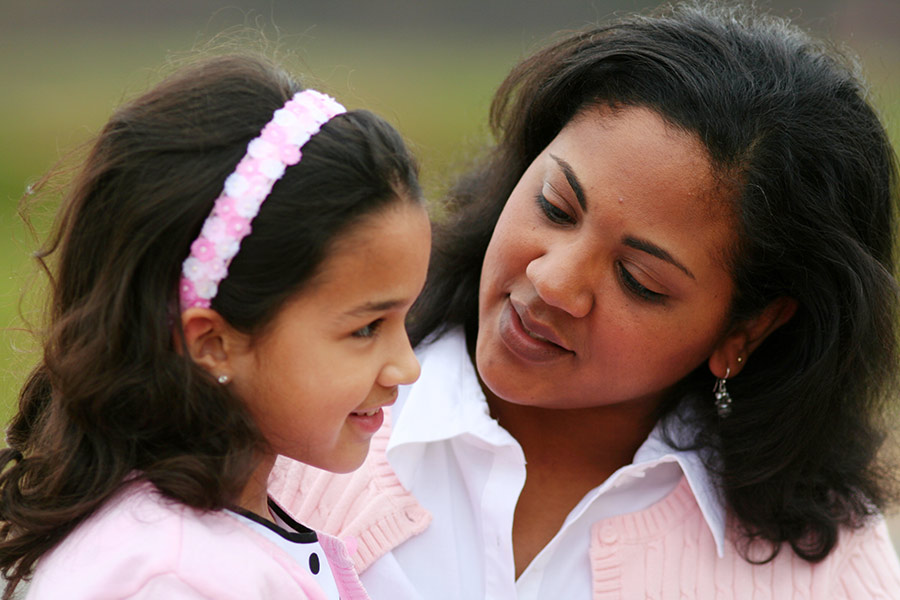 Mother talking to daughter